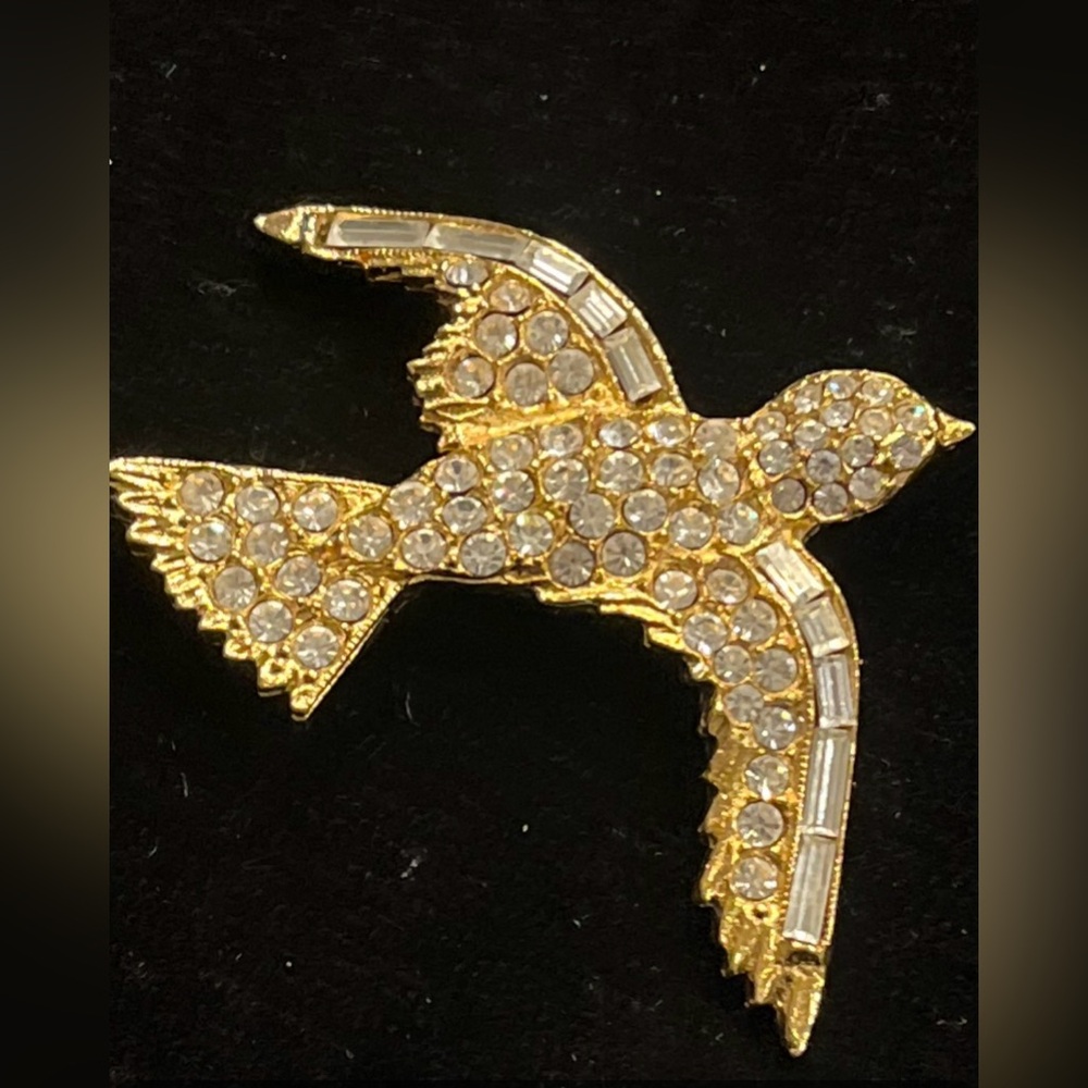 Vintage Gold Tone  Bird Brooch Adorned With Rhinestones, Baguettes, and Pave.